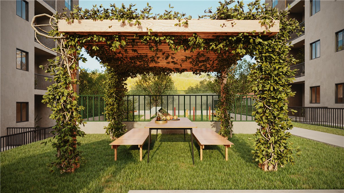 Perspectiva do gazebo do Urban, com mesa, bancos e cobertura com vegetação.